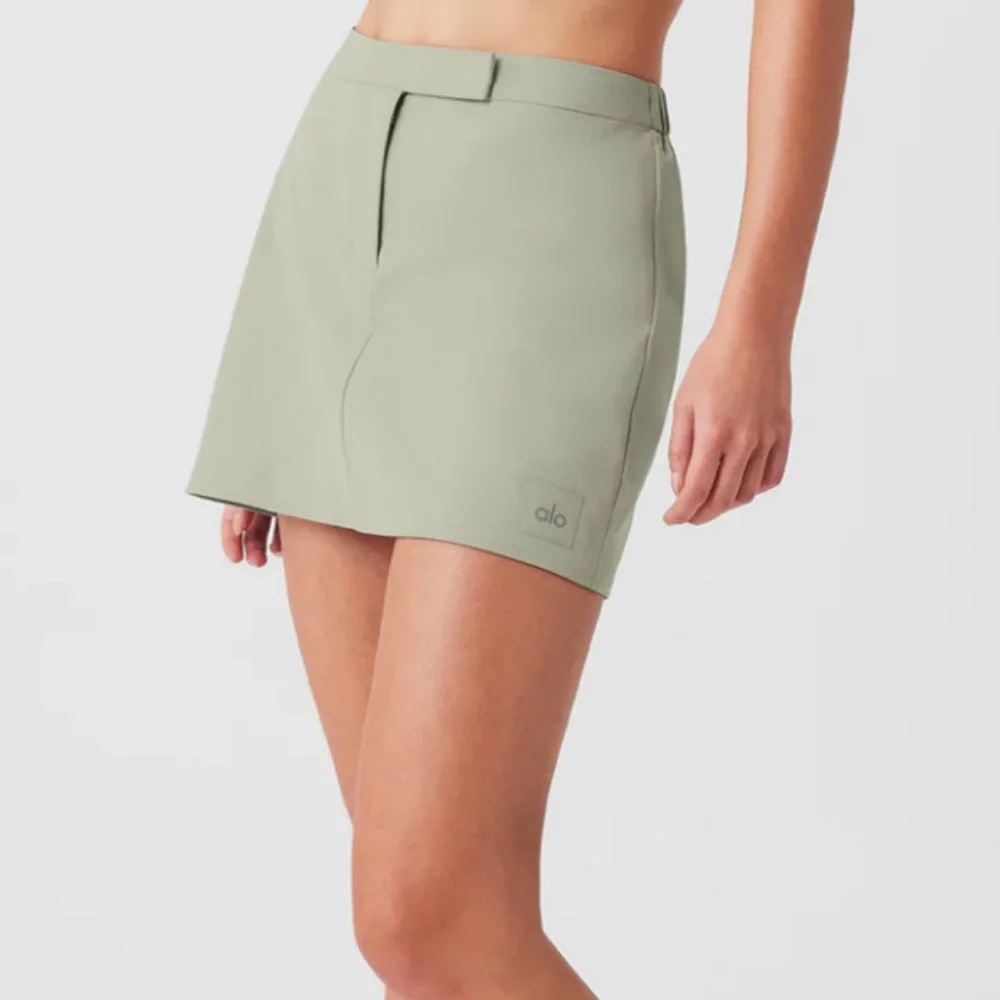 ALO | LIGHT GREEN HIGH SPEED MINI SKIRT IN LIMESTONE | XS